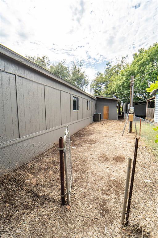 122 County Road 306 Breckenridge, TX 76424 - Photo 35 of 40 a view of a house with backyard and sitting area