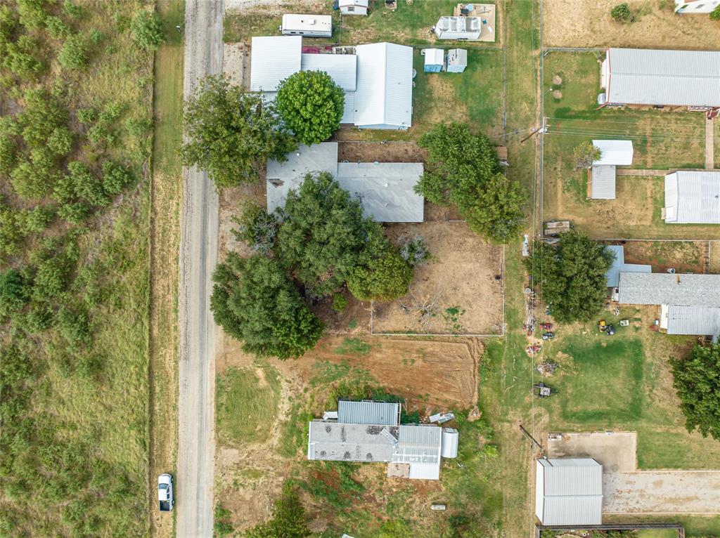 122 County Road 306 Breckenridge, TX 76424 - Photo 40 of 40 aerial view of a house with a yard