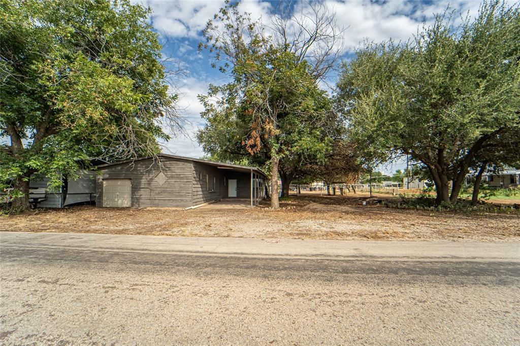 122 County Road 306 Breckenridge, TX 76424 - Photo 4 of 40 a view of a house with a yard