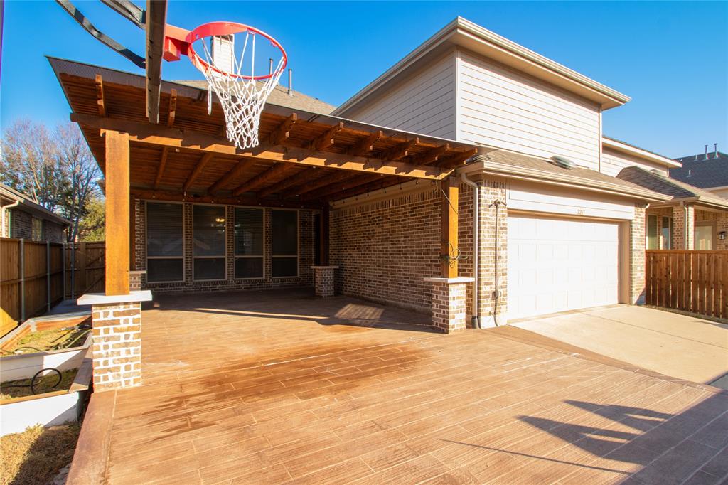 2263 Morning Dew Court Allen, TX 75013 - Photo 31 of 36 a view of a house with a backyard