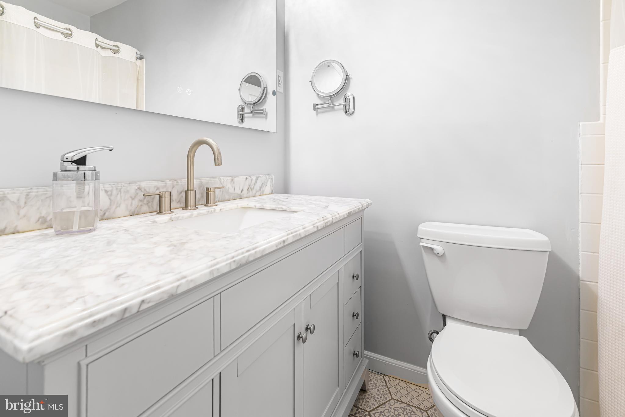 2908 Old Welsh Road Willow Grove, PA 19090 - Photo 25 of 47 Hall bath with marble vanity and tile floors