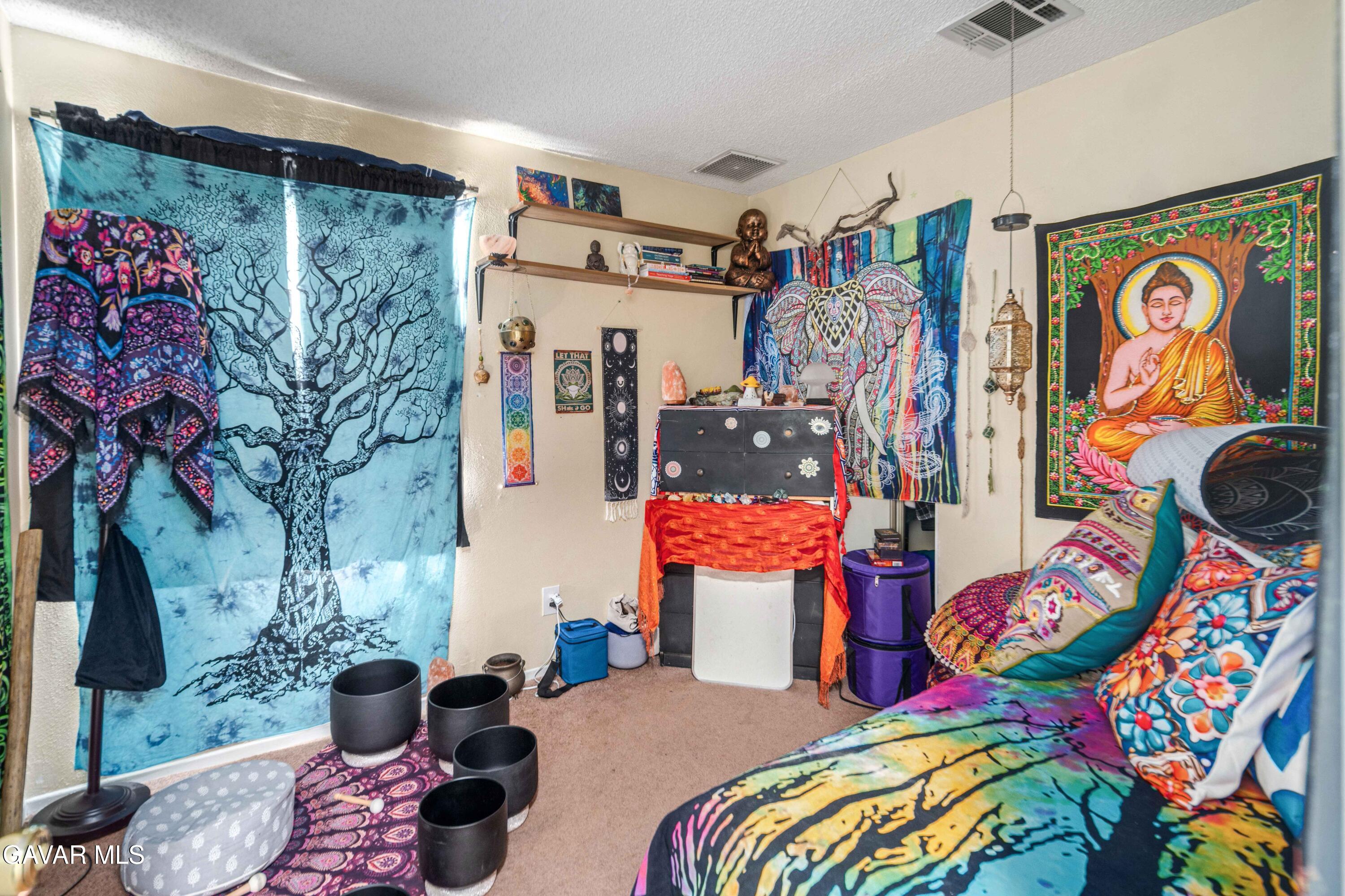 3112 Myrtle Street Rosamond, CA 93560 - Photo 18 of 49 a bedroom with a bed and a window