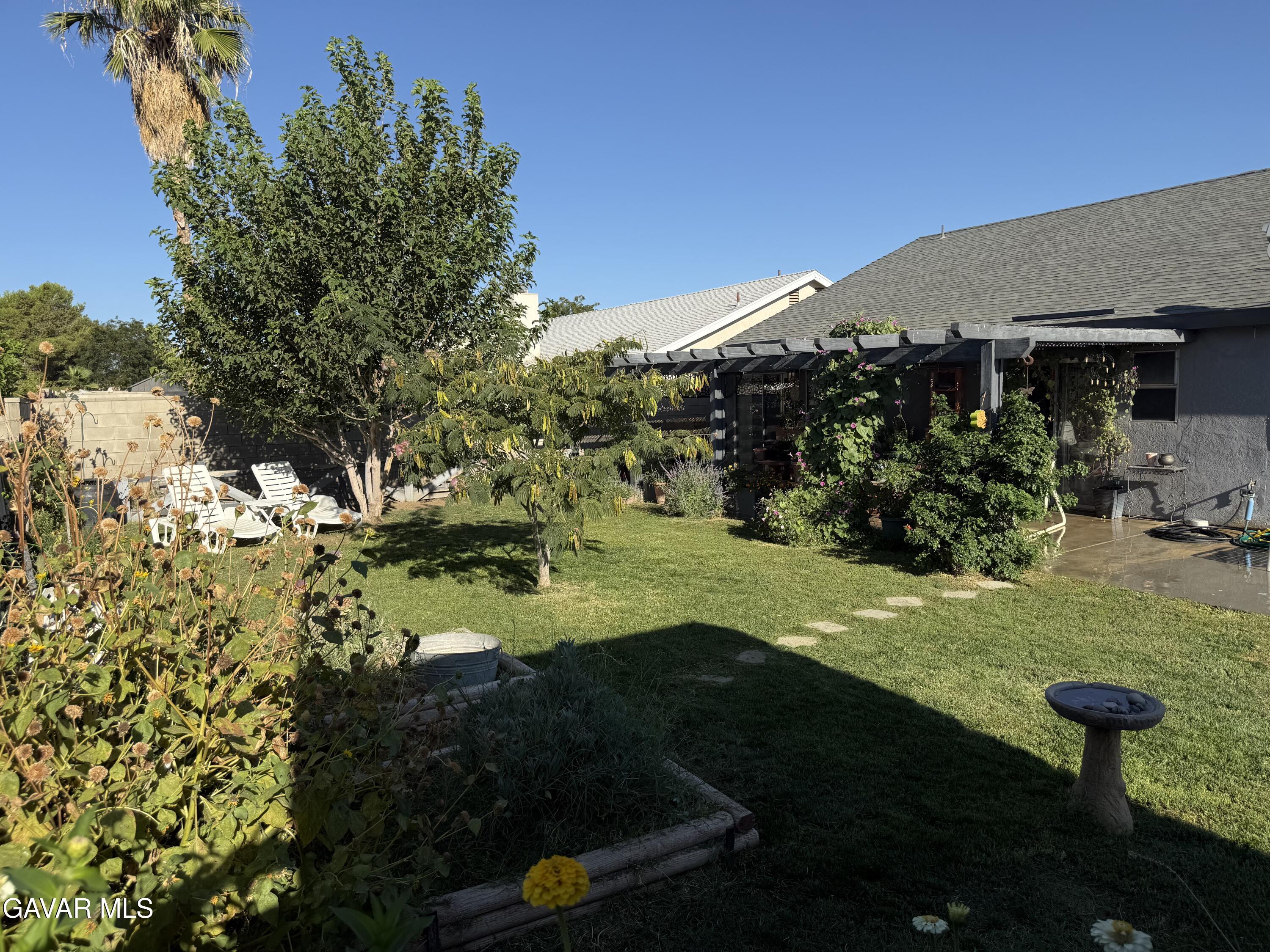 3112 Myrtle Street Rosamond, CA 93560 - Photo 43 of 49 a view of a backyard