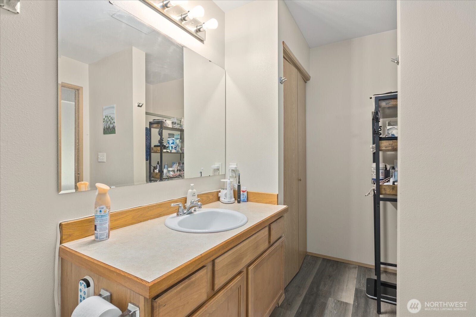 2826 Northeast 8th Street Renton, WA 98056 - Photo 9 of 20 a bathroom with a sink and a mirror