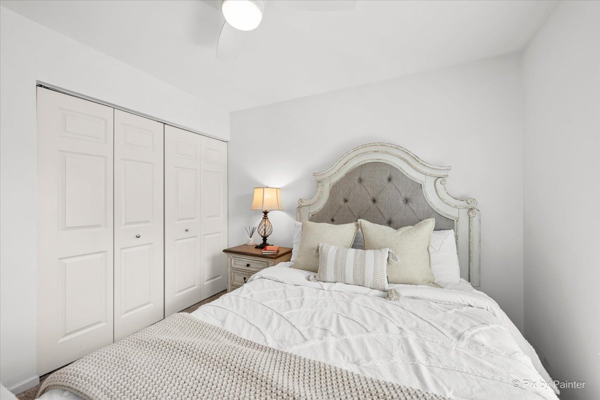 1150 Appleton Lane Geneva, IL 60134 - Photo 11 of 43 a bedroom with a bed and a painting on the wall