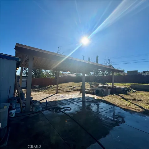 a view of a swimming pool with an outdoor space