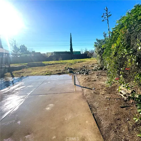 a view of a backyard of a house