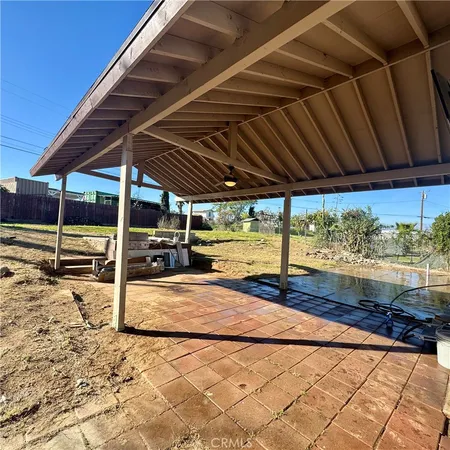 a view of a backyard of a house