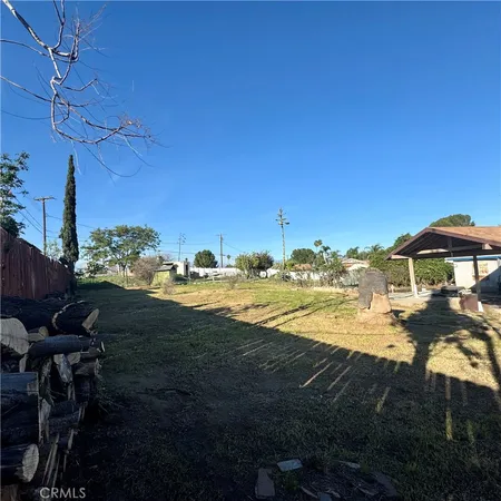 a view of a yard with an outdoor space