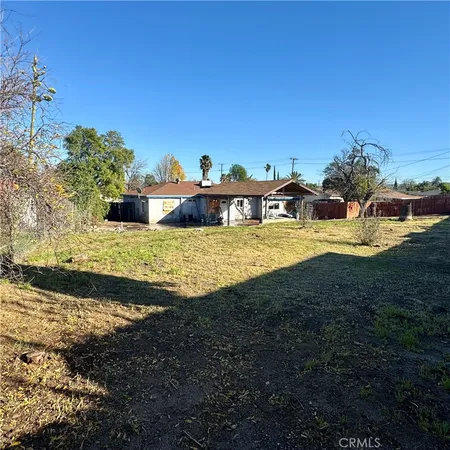 a view of a backyard of a house
