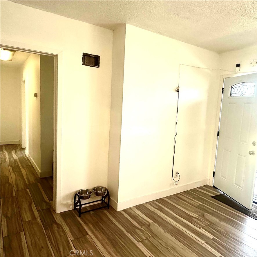 5642 Babb Avenue Riverside, CA 92503 - Photo 41 of 41 a view of a room with wooden floor