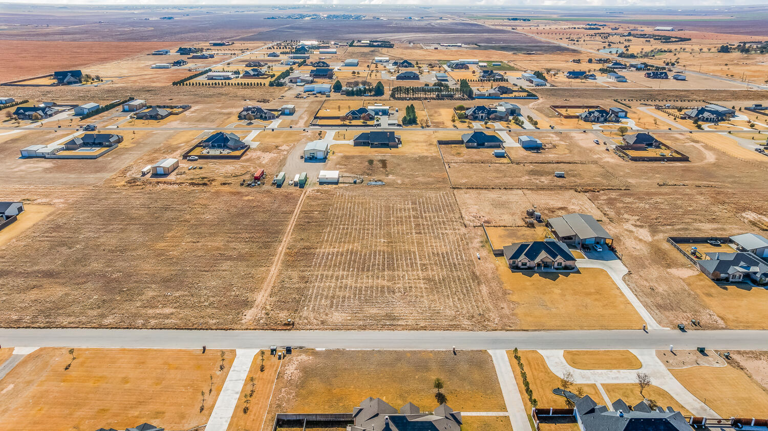 5037 C R 7920 Lubbock, TX 79424 - Photo 11 of 14 an aerial view of residential houses with outdoor space
