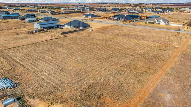 an aerial view of beach and ocean
