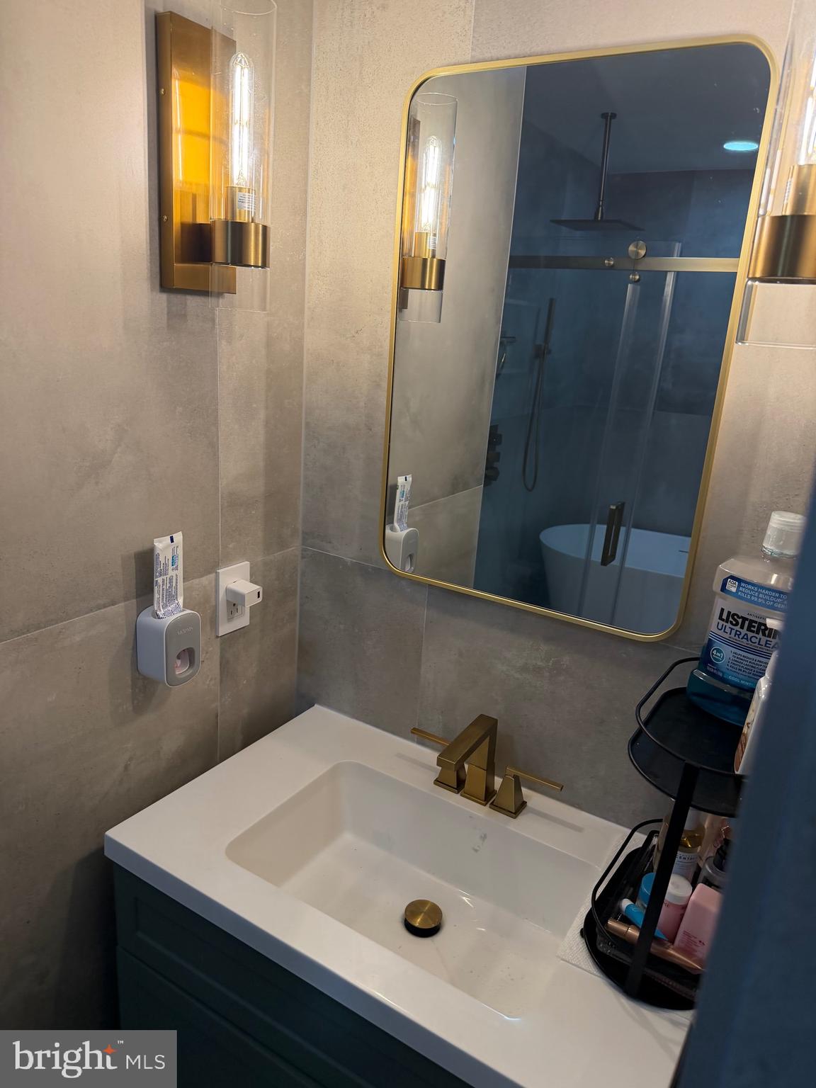 1801 Egg Harbor Road, Unit 712 Clementon, NJ 08021 - Photo 23 of 35 a bathroom with a sink and a mirror