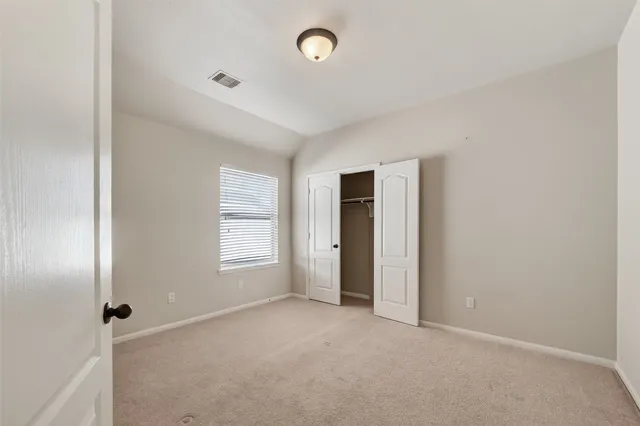 a view of small space with racks on the wall