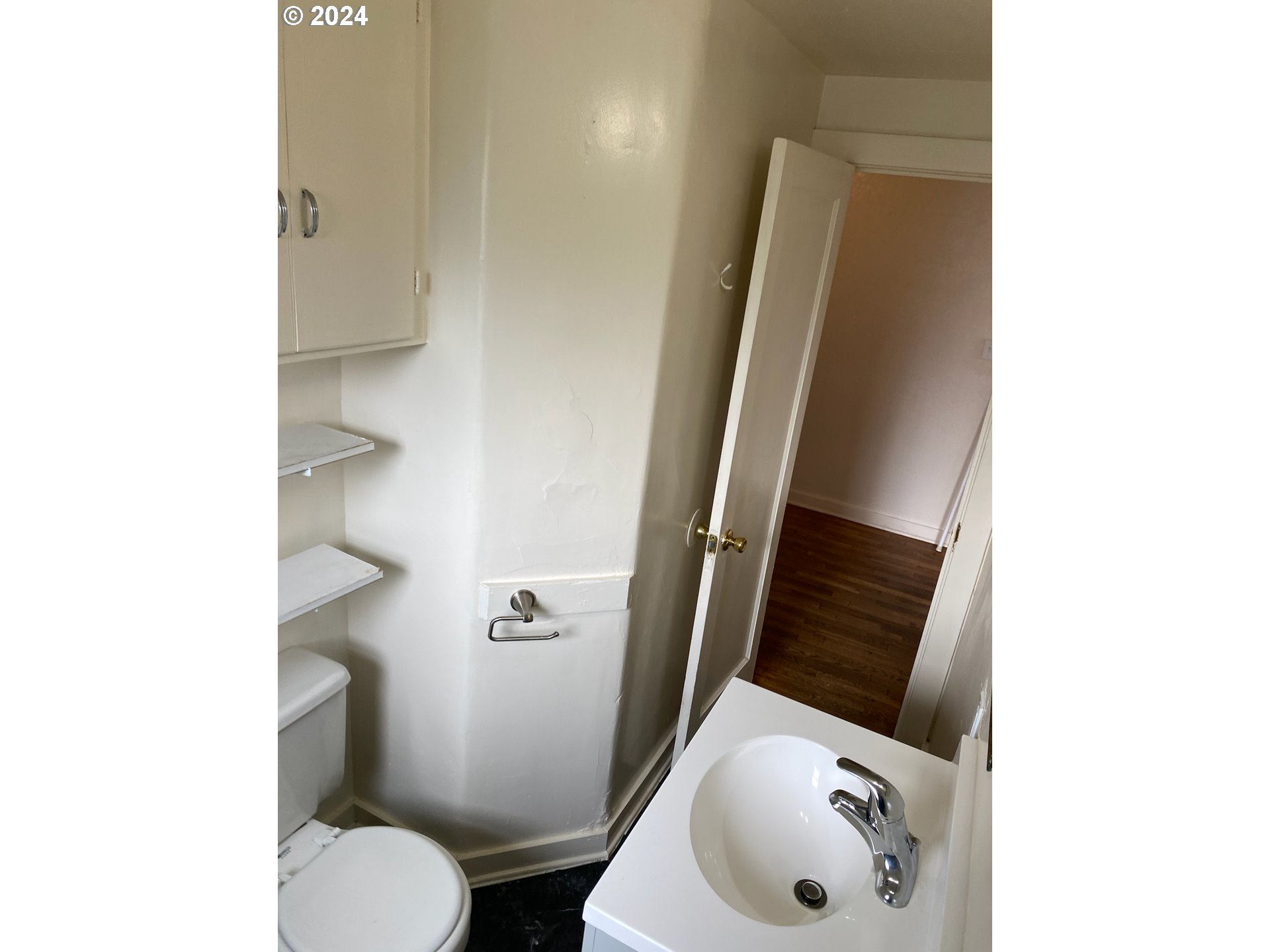 1408 Ferry Street Eugene, OR 97401 - Photo 20 of 20 a bathroom with a sink and toilet