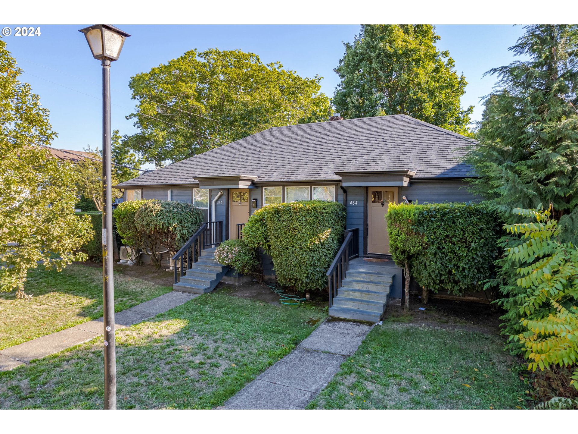 1408 Ferry Street Eugene, OR 97401 - Photo 5 of 20 a house view with a garden space