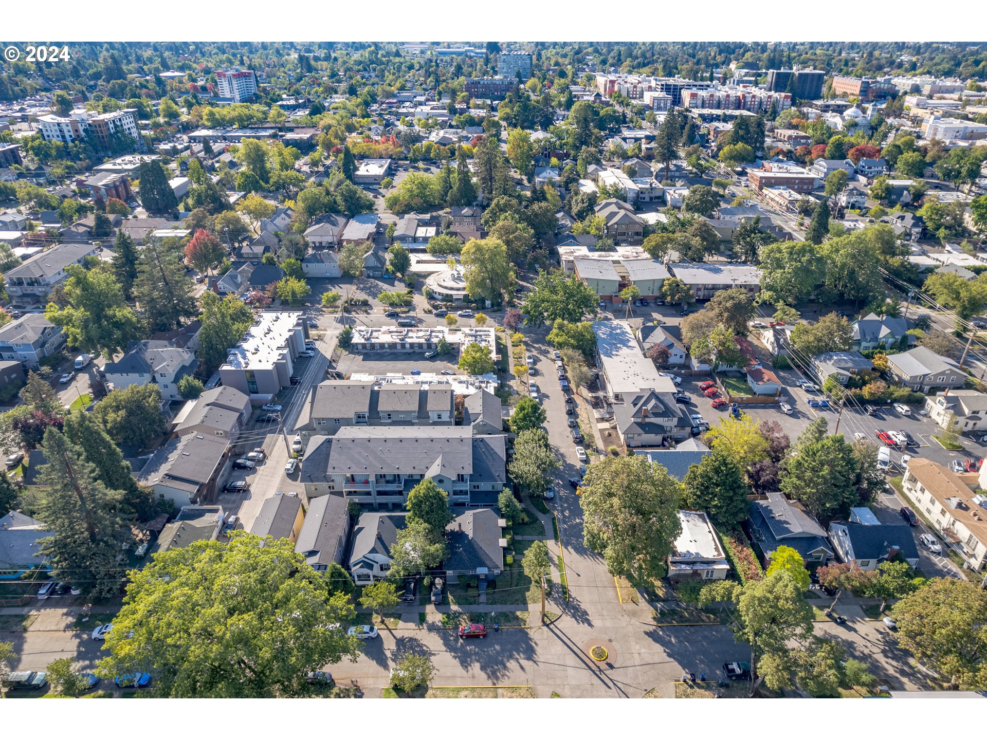 1408 Ferry Street Eugene, OR 97401 - Photo 8 of 20 an aerial view of a city with lots of residential buildings