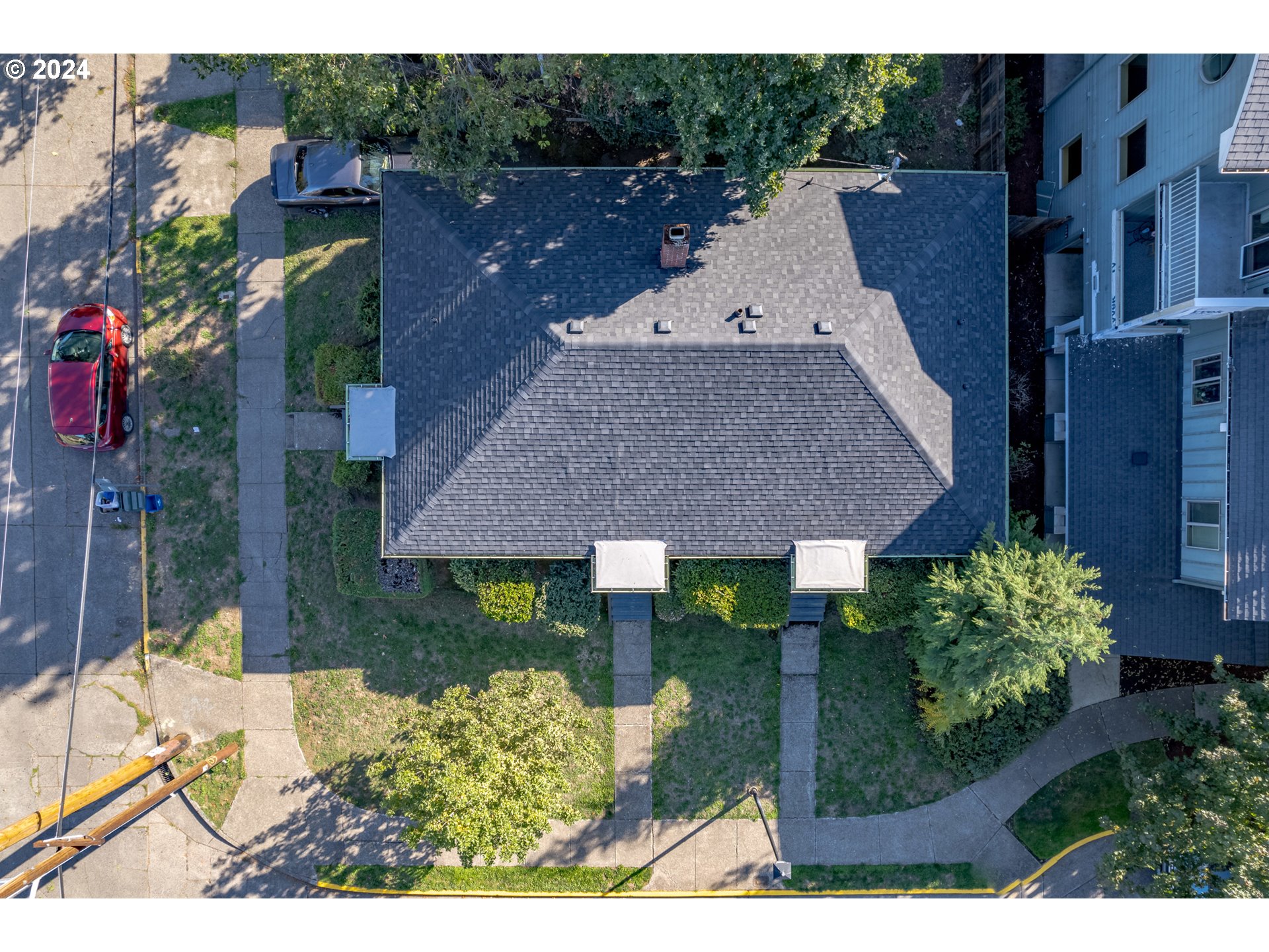 1408 Ferry Street Eugene, OR 97401 - Photo 10 of 20 a view of a house with a yard and potted plants