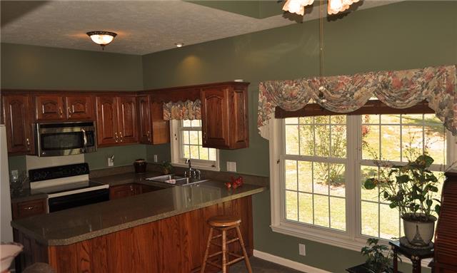 4424 Dugger Road Culleoka, TN 38451 - Photo 14 of 20 Second kitchen - part of in-law or extended family suite. Lots of light to sit with a book and tea in the mornings