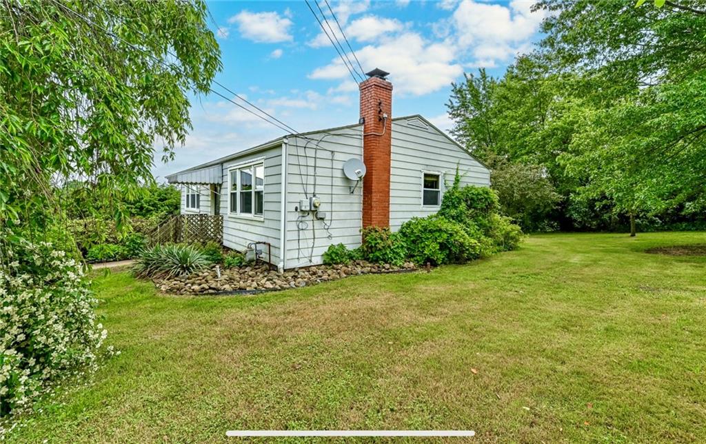 2760 Ridge Rd Extension Baden, PA 15005 - Photo 19 of 23 a view of a house with a yard and potted plants