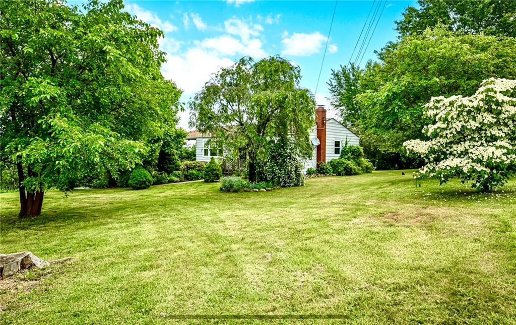 2760 Ridge Rd Extension Baden, PA 15005 - Photo 23 of 23 a view of a backyard with large trees
