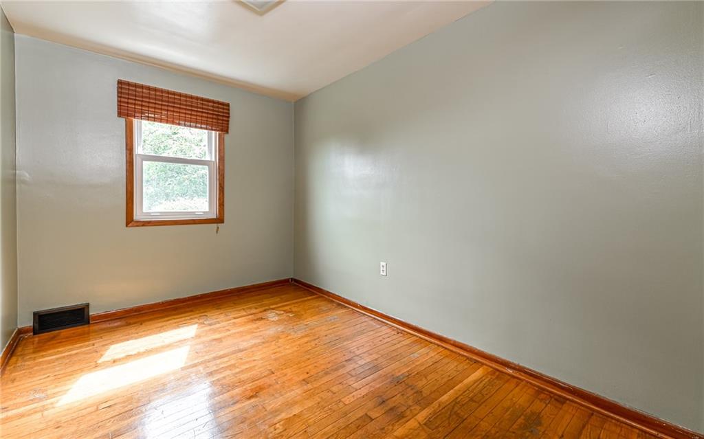 2760 Ridge Rd Extension Baden, PA 15005 - Photo 8 of 23 an empty room with a window