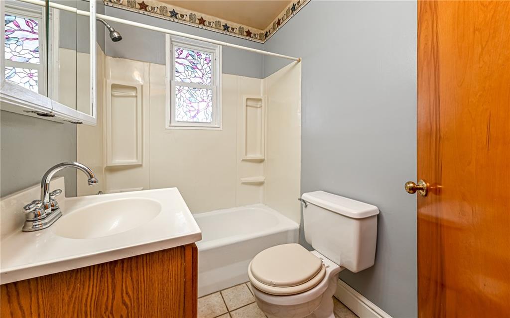 2760 Ridge Rd Extension Baden, PA 15005 - Photo 9 of 23 a bathroom with a sink toilet and shower