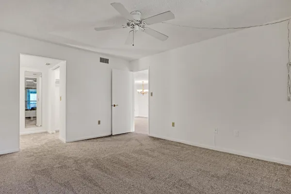 a bathroom with a shower and a sink