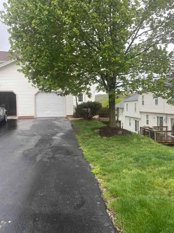 2000 Arbor Ridge Court Cheswick, PA 15024 - Photo 2 of 26 a view of a house with backyard and garden