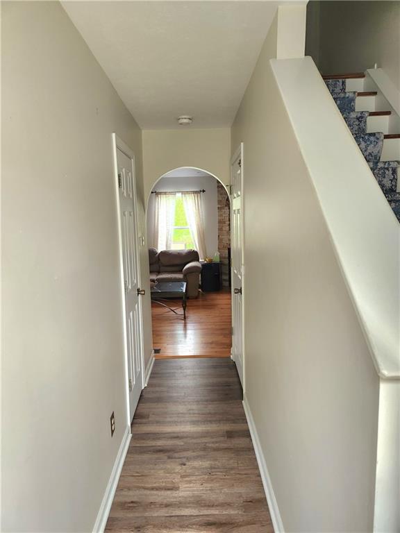 2000 Arbor Ridge Court Cheswick, PA 15024 - Photo 3 of 26 a view of a hallway with wooden floor and staircase