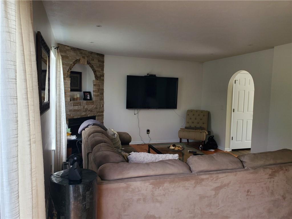 2000 Arbor Ridge Court Cheswick, PA 15024 - Photo 7 of 26 a living room with furniture and a flat screen tv