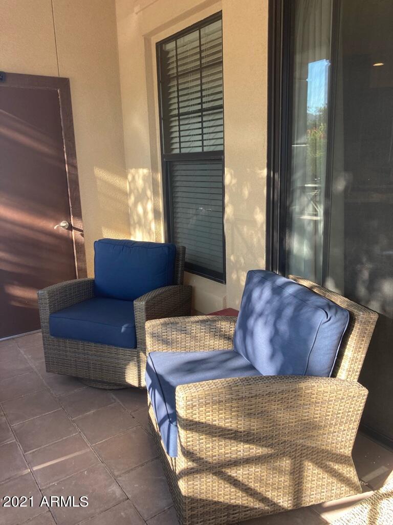 7291 North Scottsdale Road, Unit 1004 Paradise Valley, AZ 85253 - Photo 27 of 28 Relaxing on the Patio
