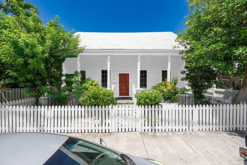 818 Elizabeth Street, Unit FRONT Key West, FL 33040 - Photo 1 of 4 a front view of a house