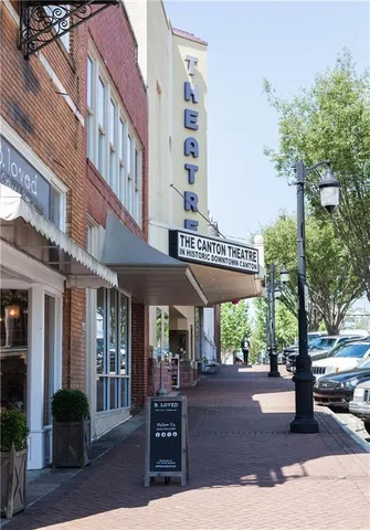 a front view of a building with street view