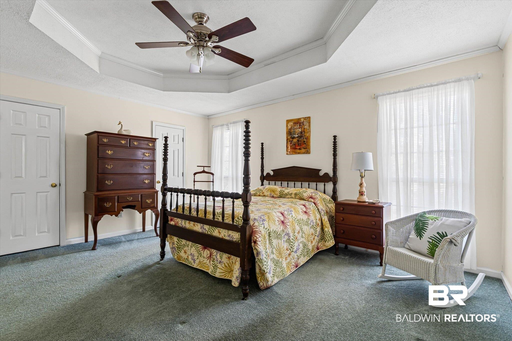 431 Simms Drive Saraland, AL 36571 - Photo 11 of 34 Bedroom with a raised ceiling, crown molding, multiple windows, and carpet