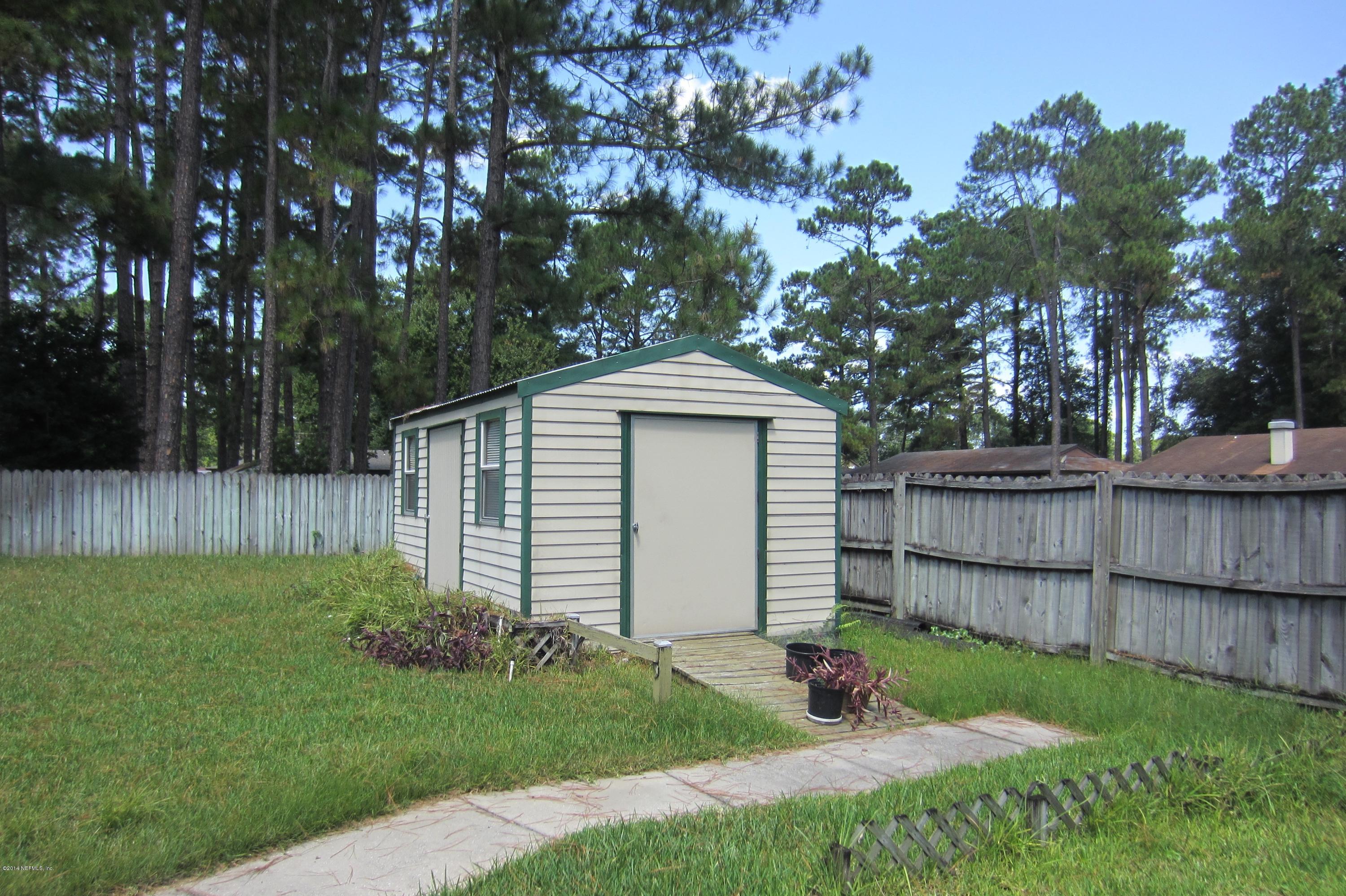 1936 Blair Road Jacksonville, FL 32221 - Photo 12 of 14 a view of a backyard with a garden