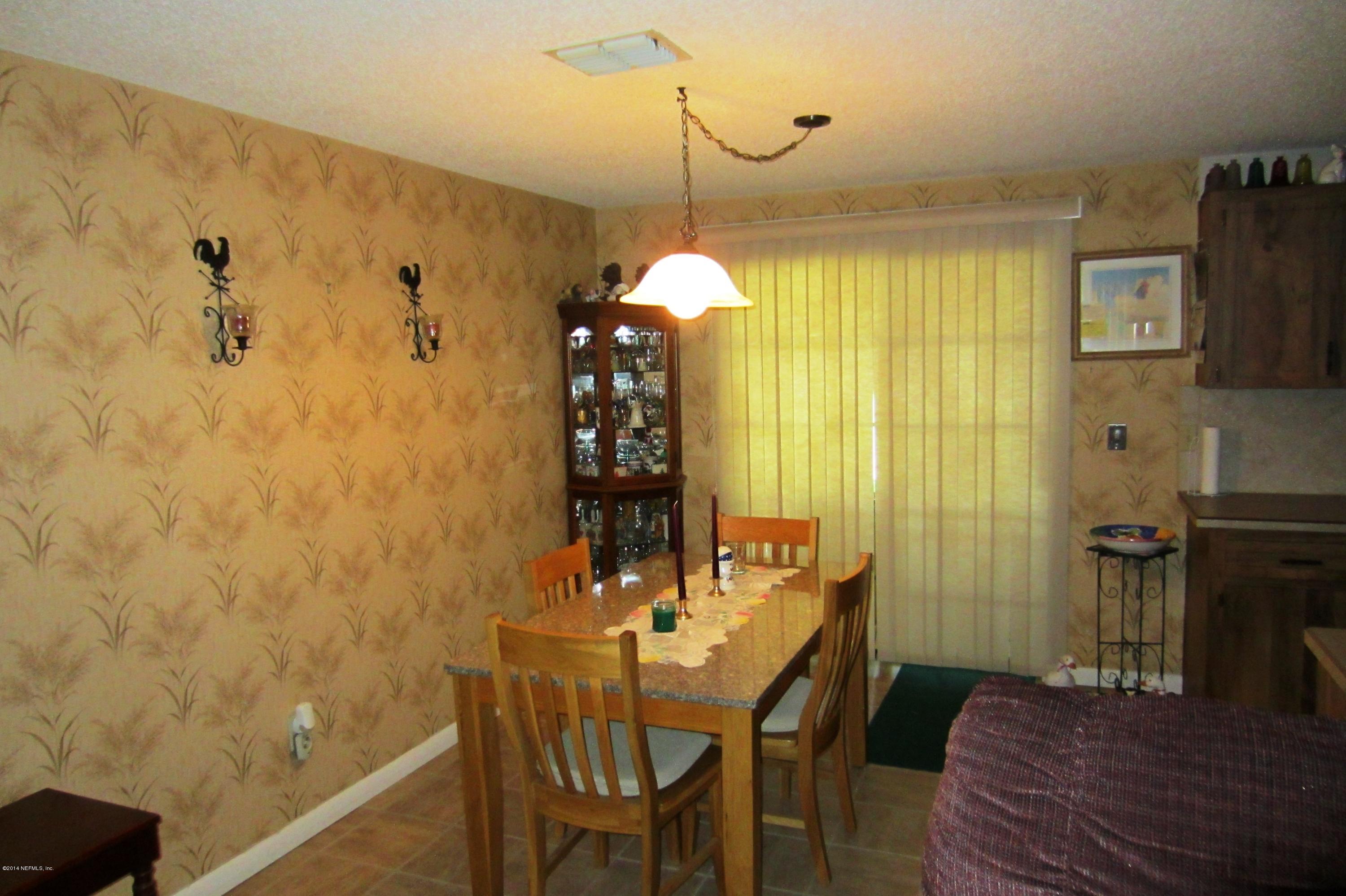 1936 Blair Road Jacksonville, FL 32221 - Photo 5 of 14 a dining room with furniture and window