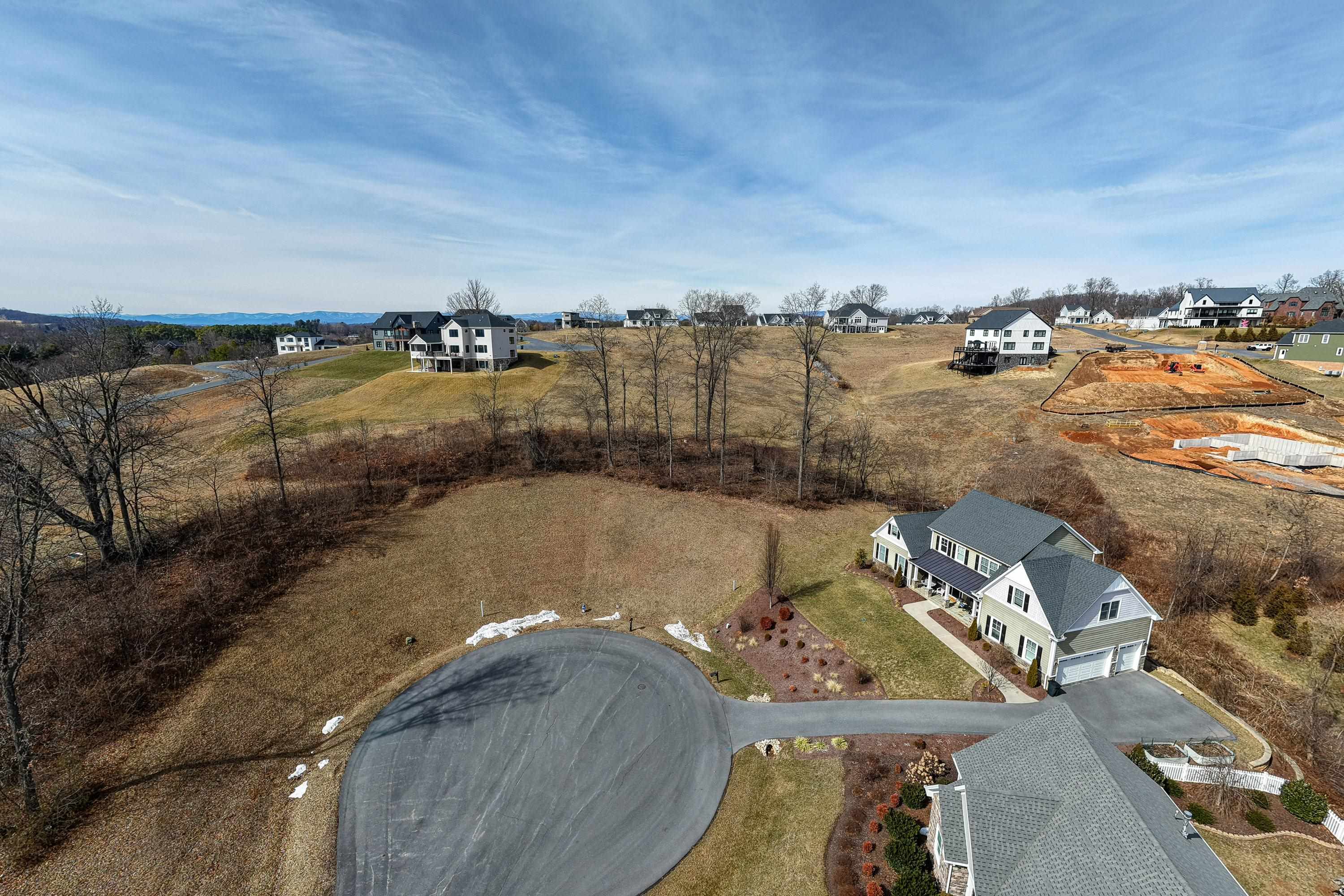 140 Markham Place Harrisonburg, VA 22801 - Photo 2 of 42 an aerial view of a house with a lake view