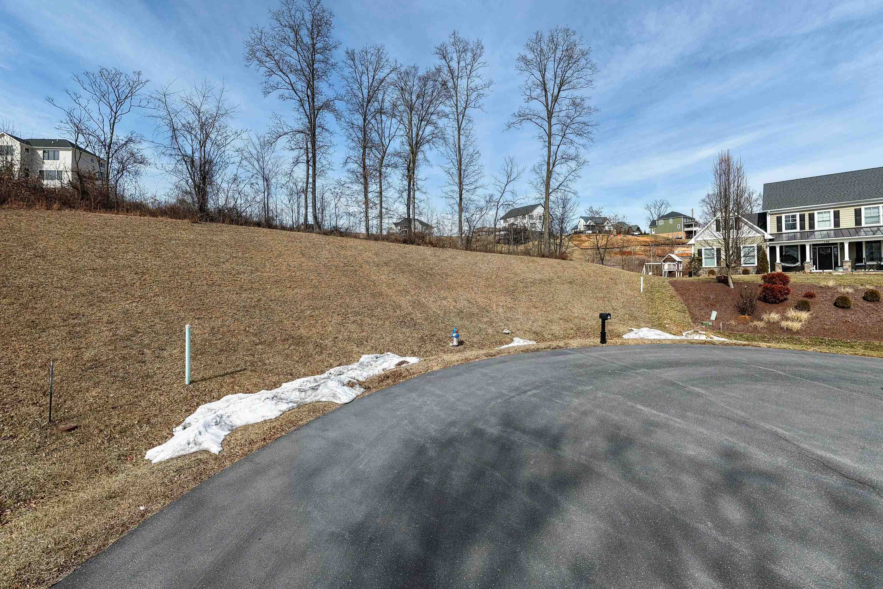 140 Markham Place Harrisonburg, VA 22801 - Photo 3 of 42 a view of a lake with a building in the background