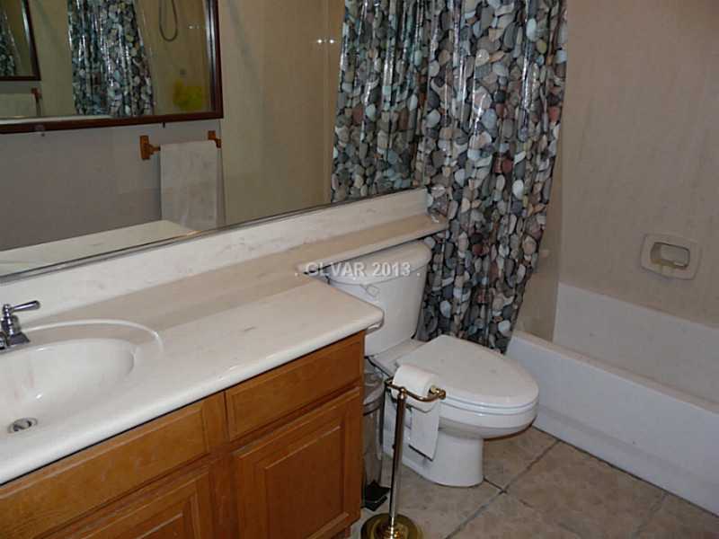2387 Rainswept Avenue Henderson, NV 89052 - Photo 13 of 25 Bathroom. FULL EN-SUITE IN DOWNSTAIRS BEDROOM