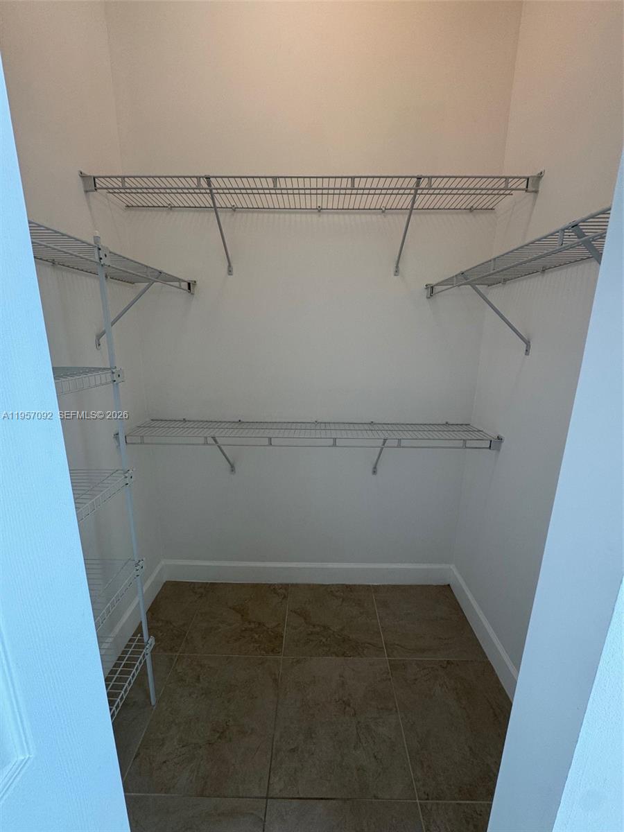 1723 Southwest 2nd Avenue, Unit P08 Miami, FL 33129 - Photo 12 of 21 a view of a room with racks on the wall