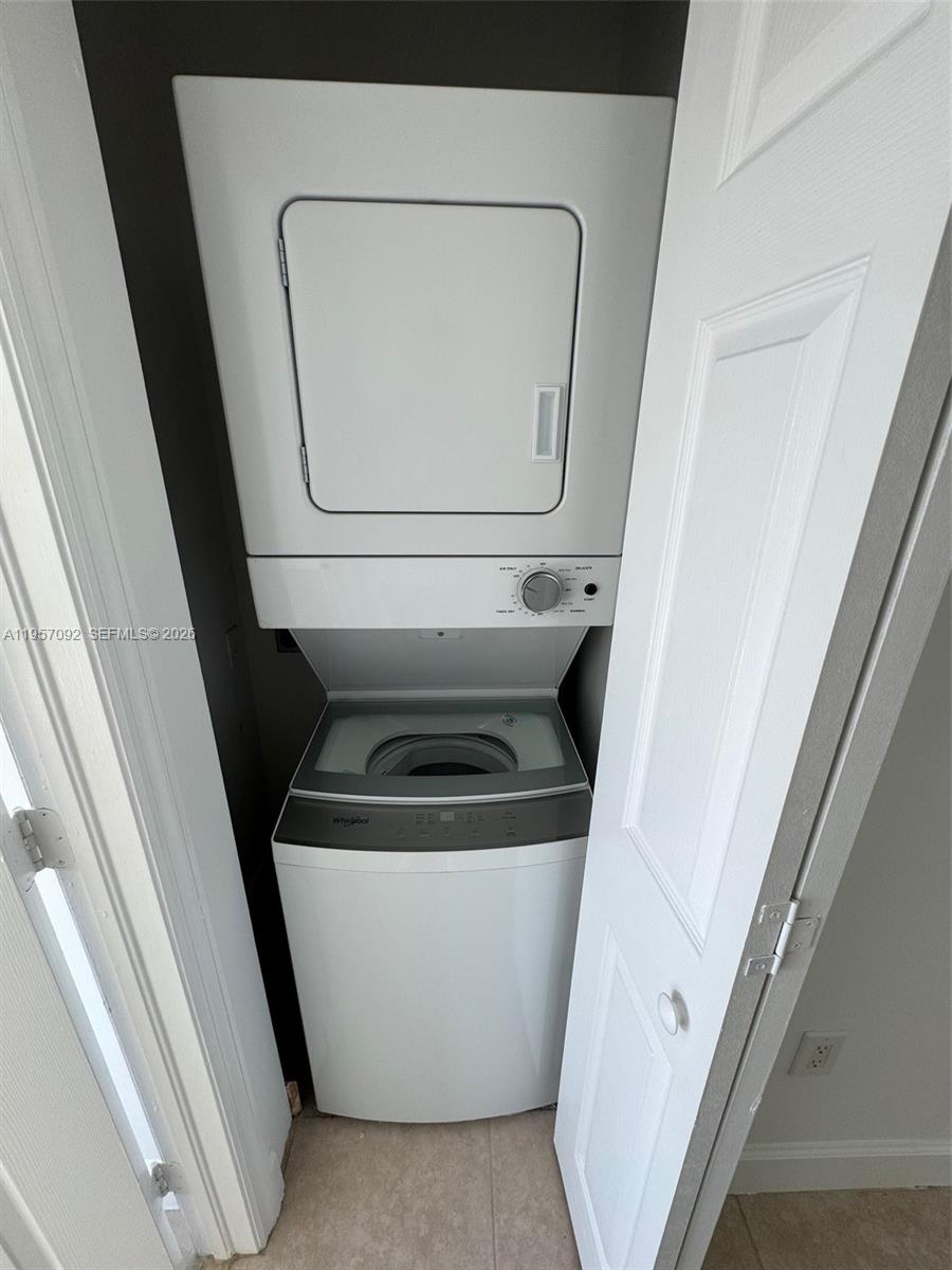 1723 Southwest 2nd Avenue, Unit P08 Miami, FL 33129 - Photo 16 of 21 a close up view of a washer and dryer