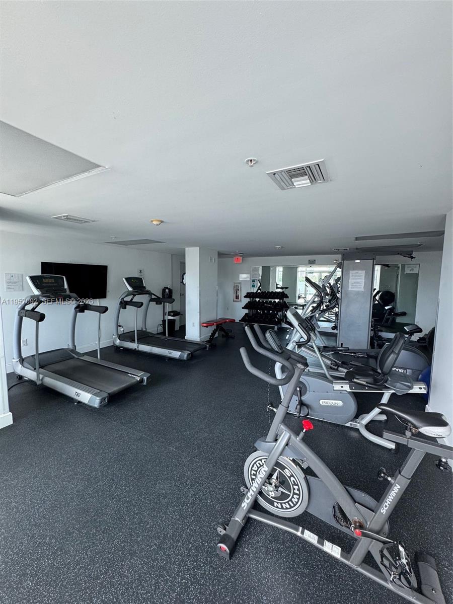 1723 Southwest 2nd Avenue, Unit P08 Miami, FL 33129 - Photo 21 of 21 a room with gym equipment