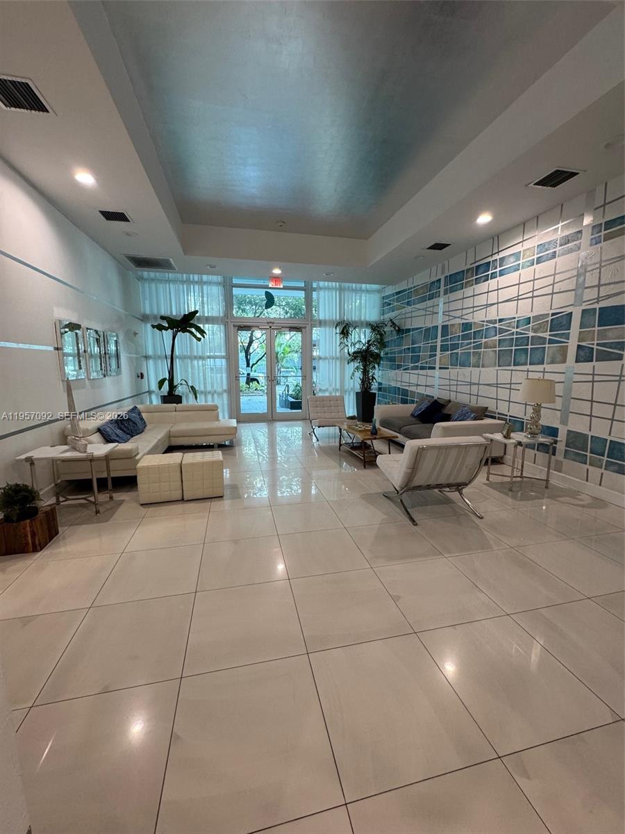 1723 Southwest 2nd Avenue, Unit P08 Miami, FL 33129 - Photo 3 of 21 a living room with furniture