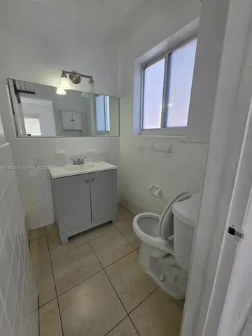 a kitchen that has a sink and a stove