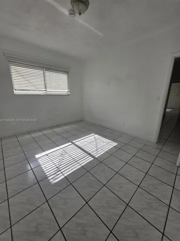 a view of a room & window