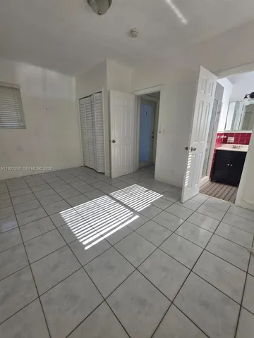 a bathroom with a sink and a shower