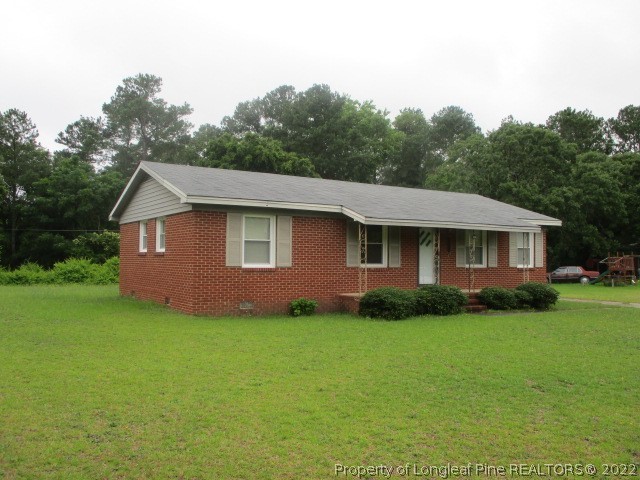 154 Sandy Ridge Church Road Rockingham, NC 28379 - Photo 2 of 19 a aerial view of a house with a yard
