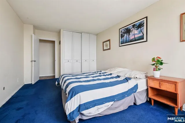 a bathroom with a sink toilet vanity and tub